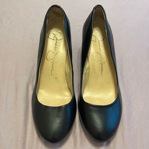 Black low heel-wedge style.